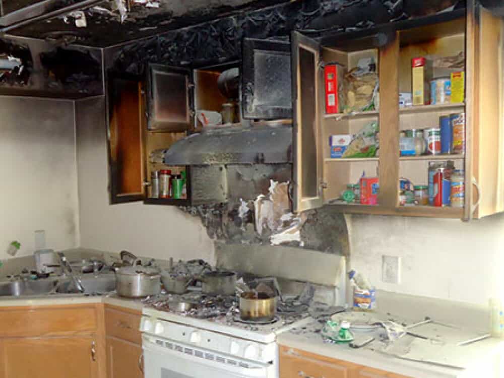 A fire and smoke damaged kitchen before fire damage restoration services